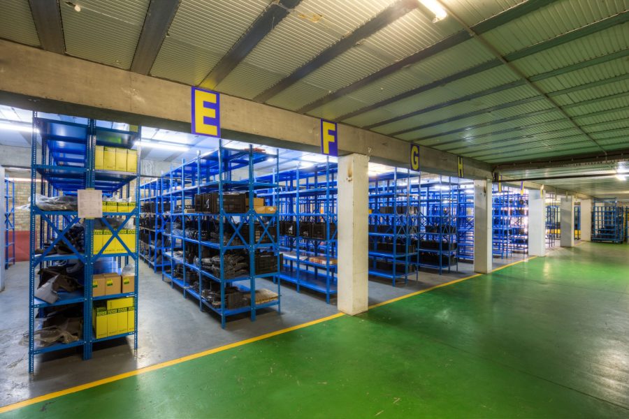 Blue Krost shelving and racking bolt and nut shelves in warehouse.