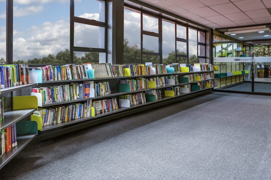 Krost Shelving & Racking Green and Yellow Library Shelve with a collection of books.
