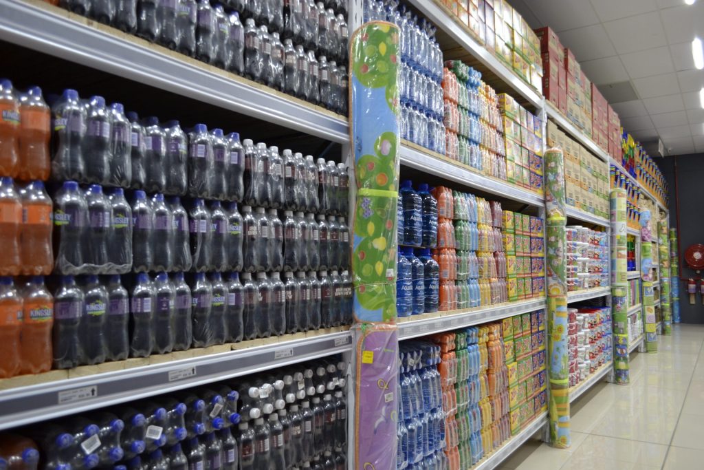 Selective pallet racking packed with goods in retail store