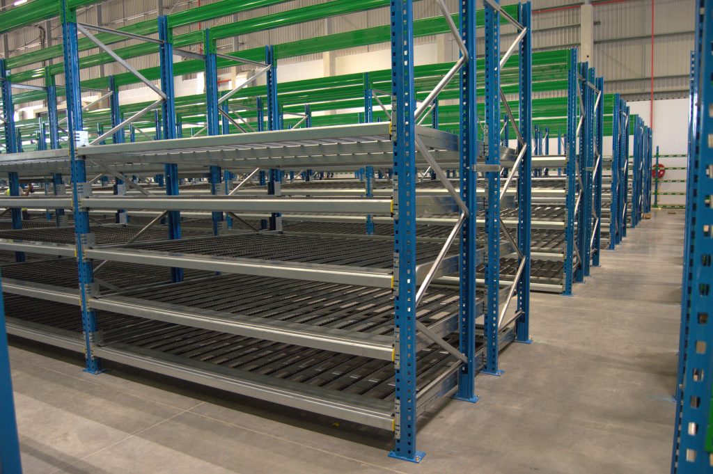 Carton live racking system showcasing efficient flow racking, a space-saving alternative to rack-supported mezzanines.