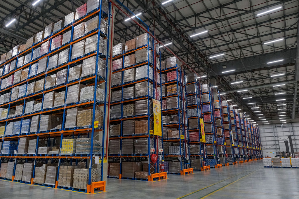 Warehouse with selective storage racking system for high-volume palletised goods.