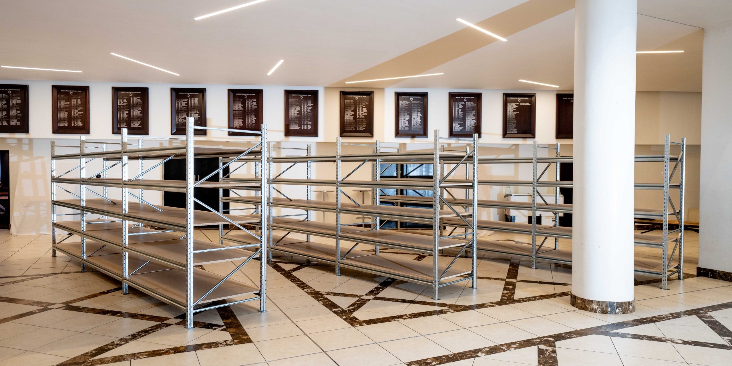 DSC07978 3 empty long span racking structures in a fancy lobby serving as light-duty racking systems