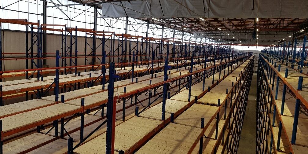 20191112_072556_resized Aerial view of a high multilevel warehouse shelving system in a large storage facility