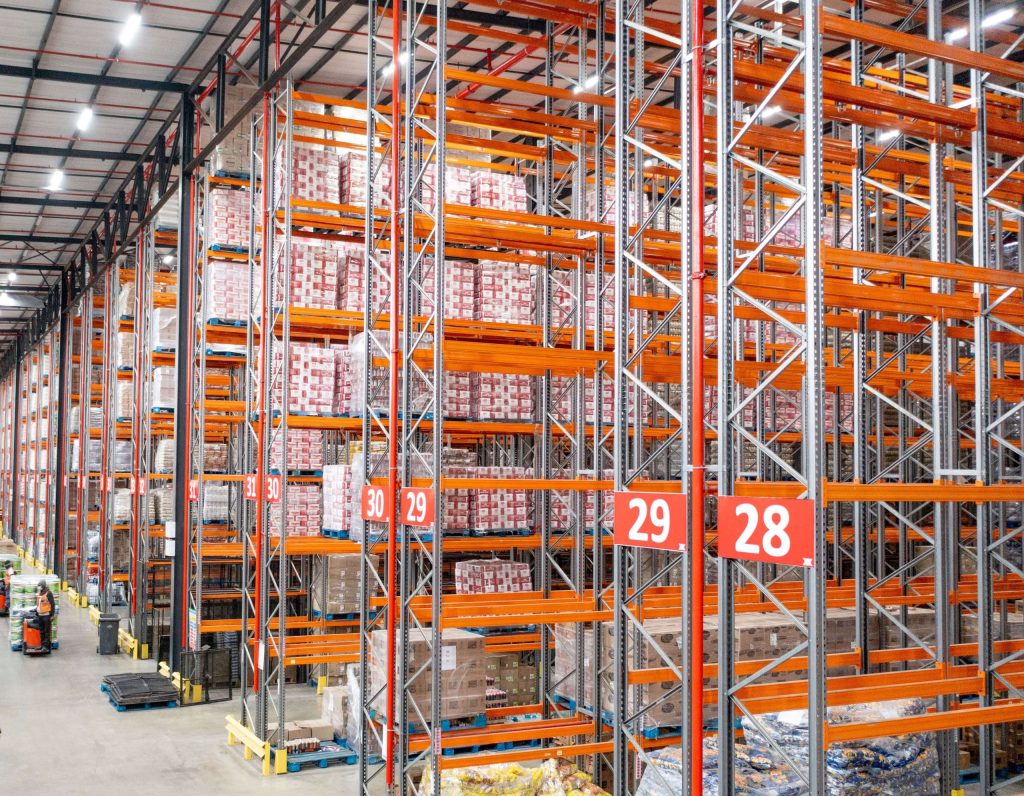 Multi-level pallet racking in a large warehouse as an example for cold room shelving
