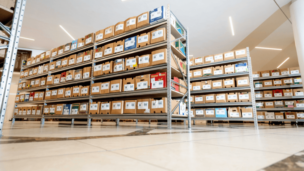 Gondola shelving fully stacked showcasing the difference to long span shelving