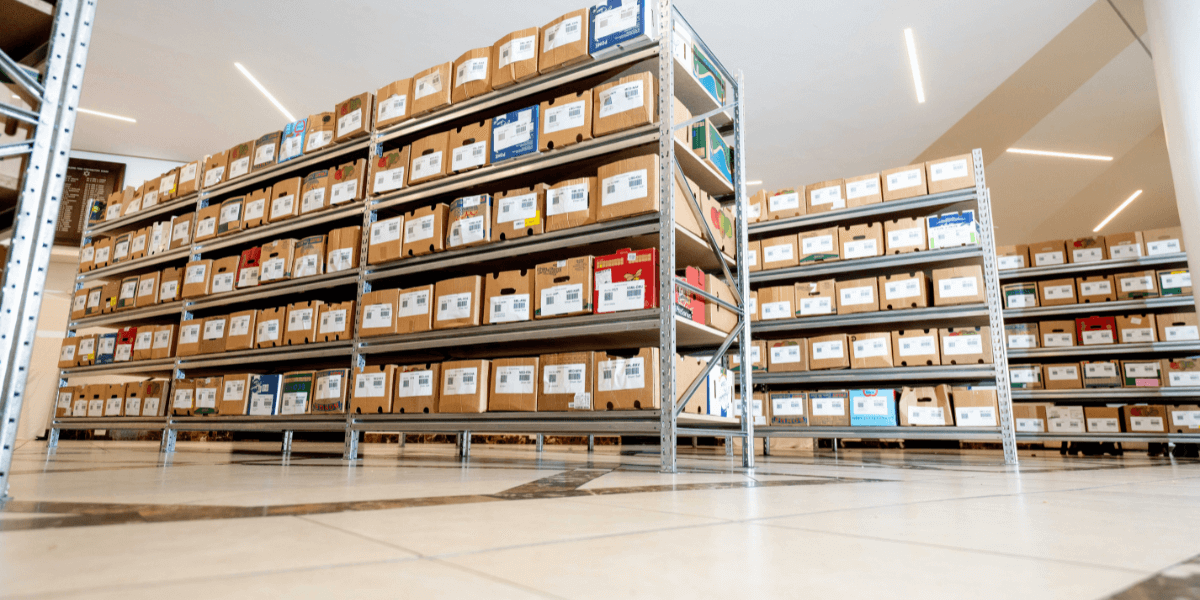 Gondola shelving fully stacked showcasing the difference to long span shelving