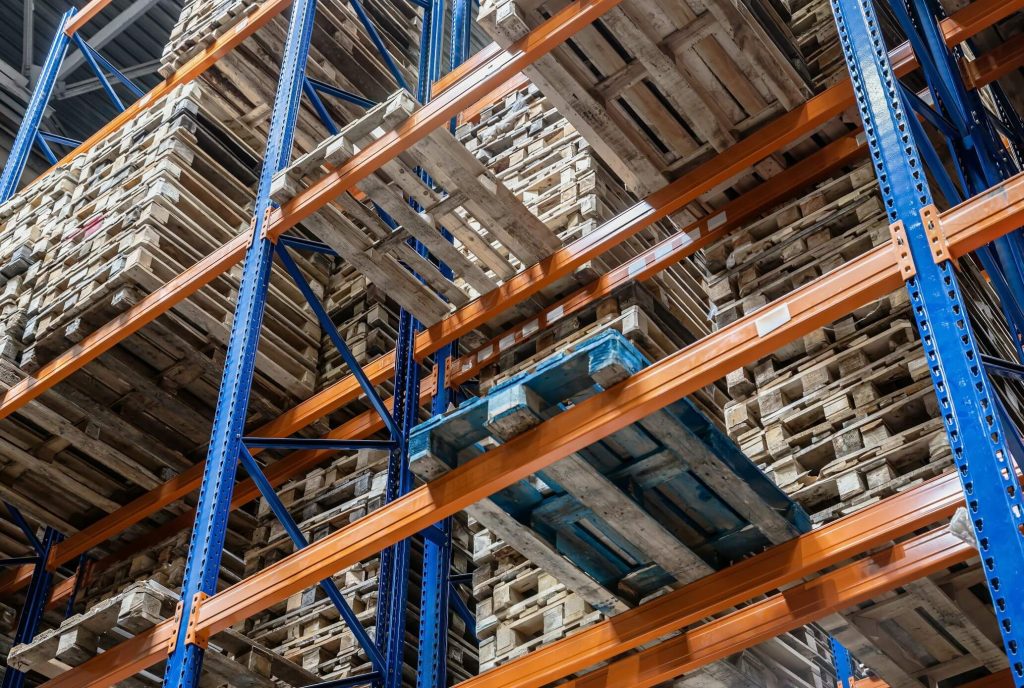Large distribution warehouse with filled pallet racks