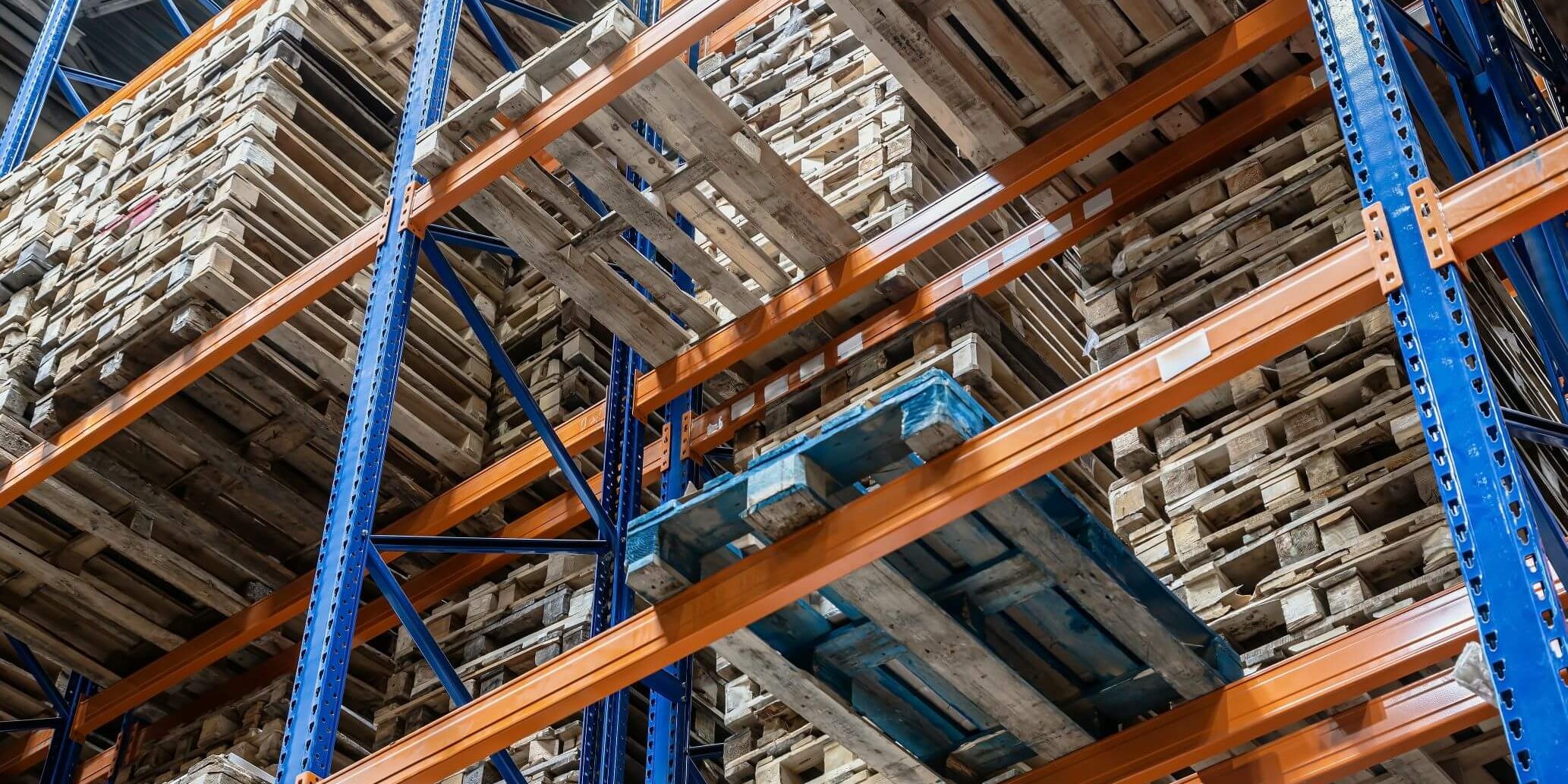 Large distribution warehouse with filled pallet racks