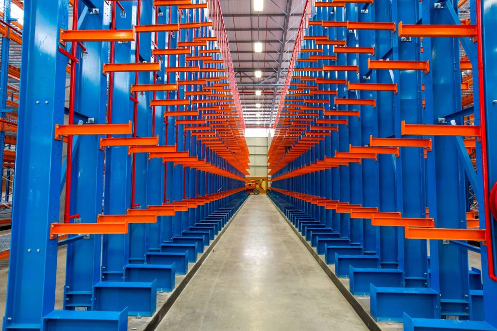 Structural mezzanine vs. cantilever: An aisle shot of an empty cantilever racking structure