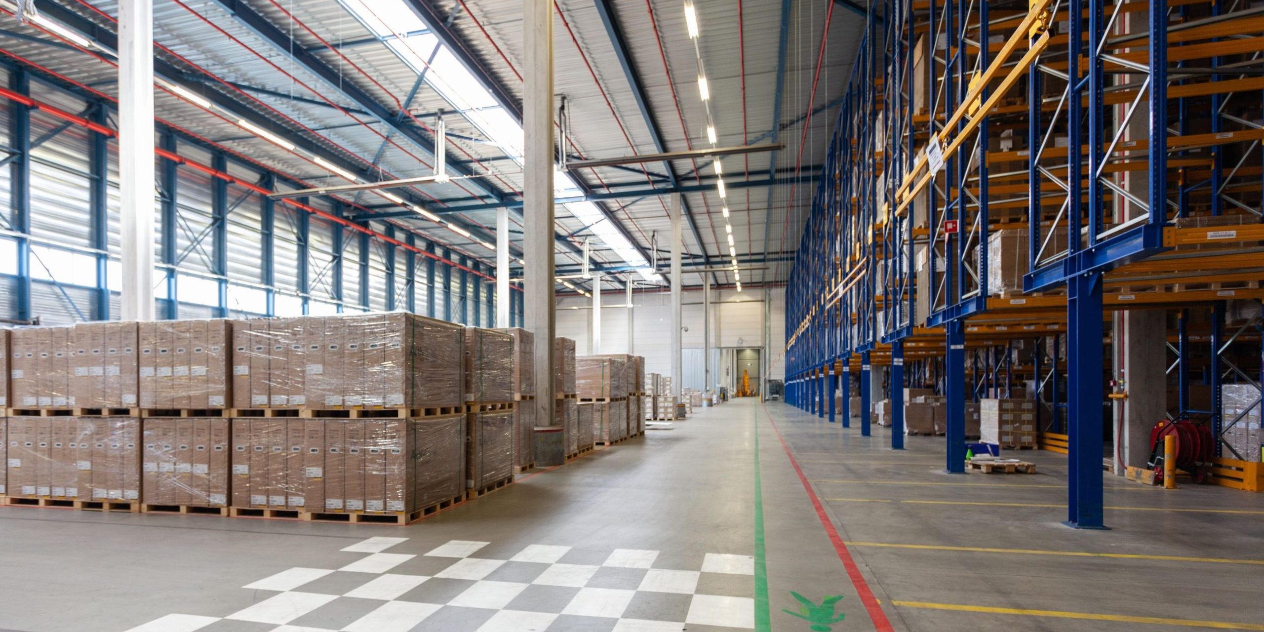view-full-warehouse-with-forklift (1) A large warehouse operation installed with heavy-duty racking