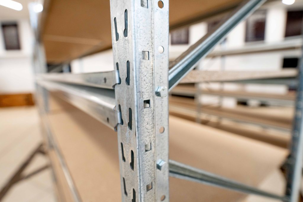A close up of a long-span rack shelf in a selective storage vs. long-span racking comparison